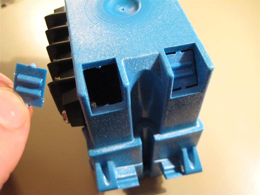 Junction box bottom tab removed